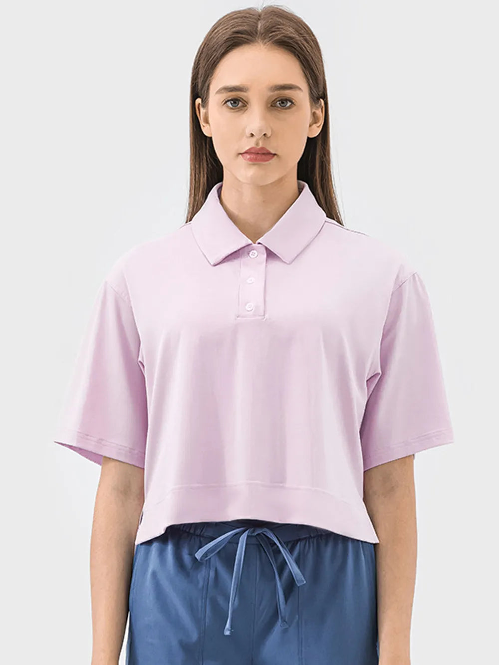Half button short sleeve active tee close up detail