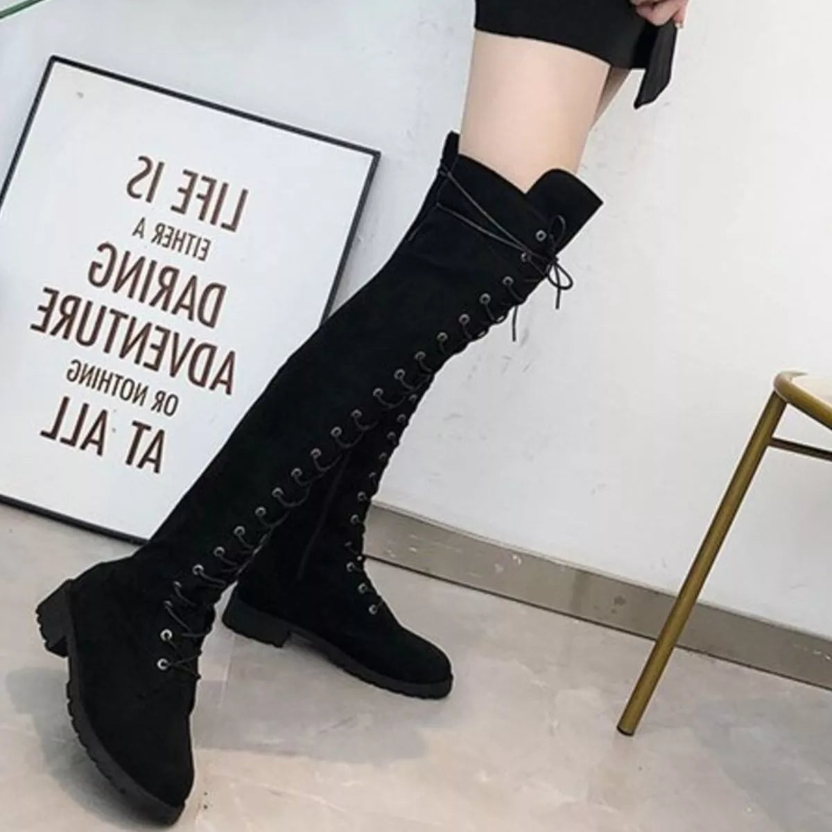 Lace up over the knee boots standing pair