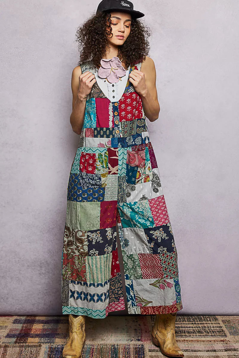 Sage patchwork wide leg jumpsuit V neckline detail