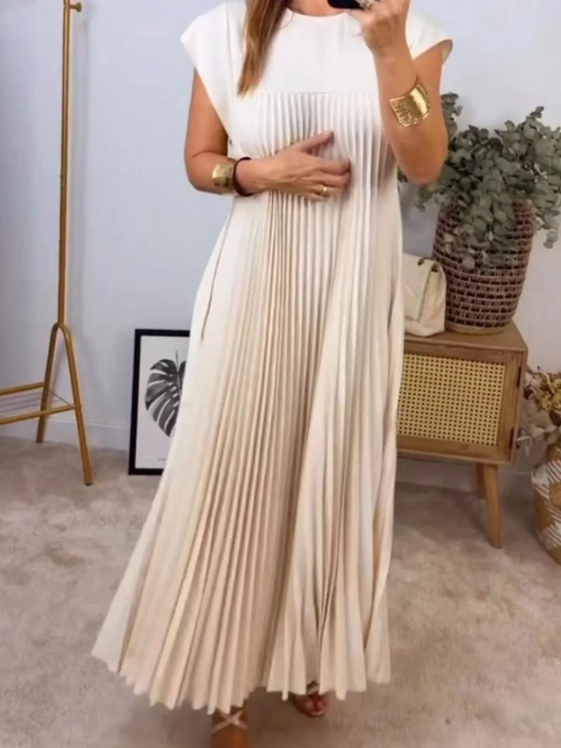 cream pleated round neck maxi dress with pockets front view