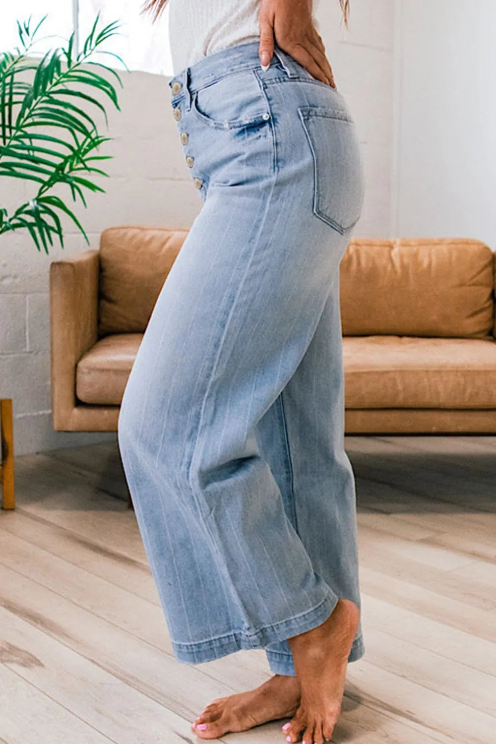Button fly wide leg denim back view with pockets