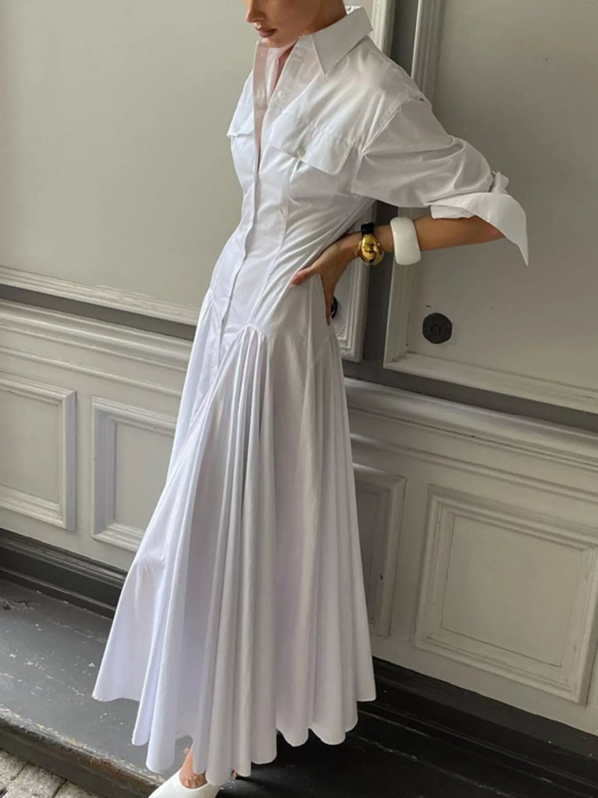 Close view of the button placket on the dress