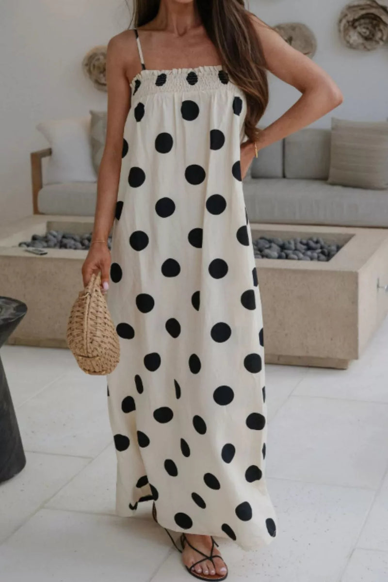 White polka dot spaghetti strap maxi dress front view