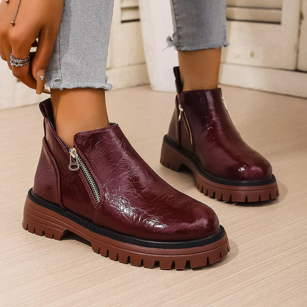 black round toe block heel boots worn with denim