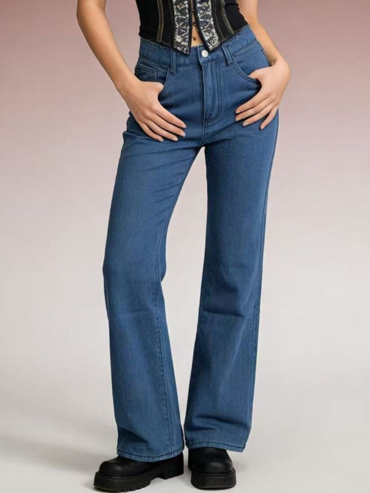 Side profile of high waist wide leg jeans