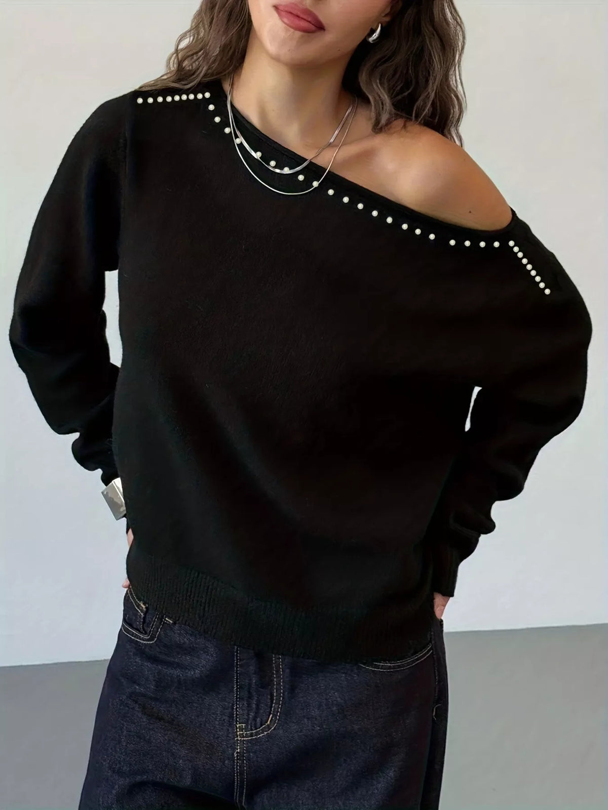 Stud detailing on black knit top