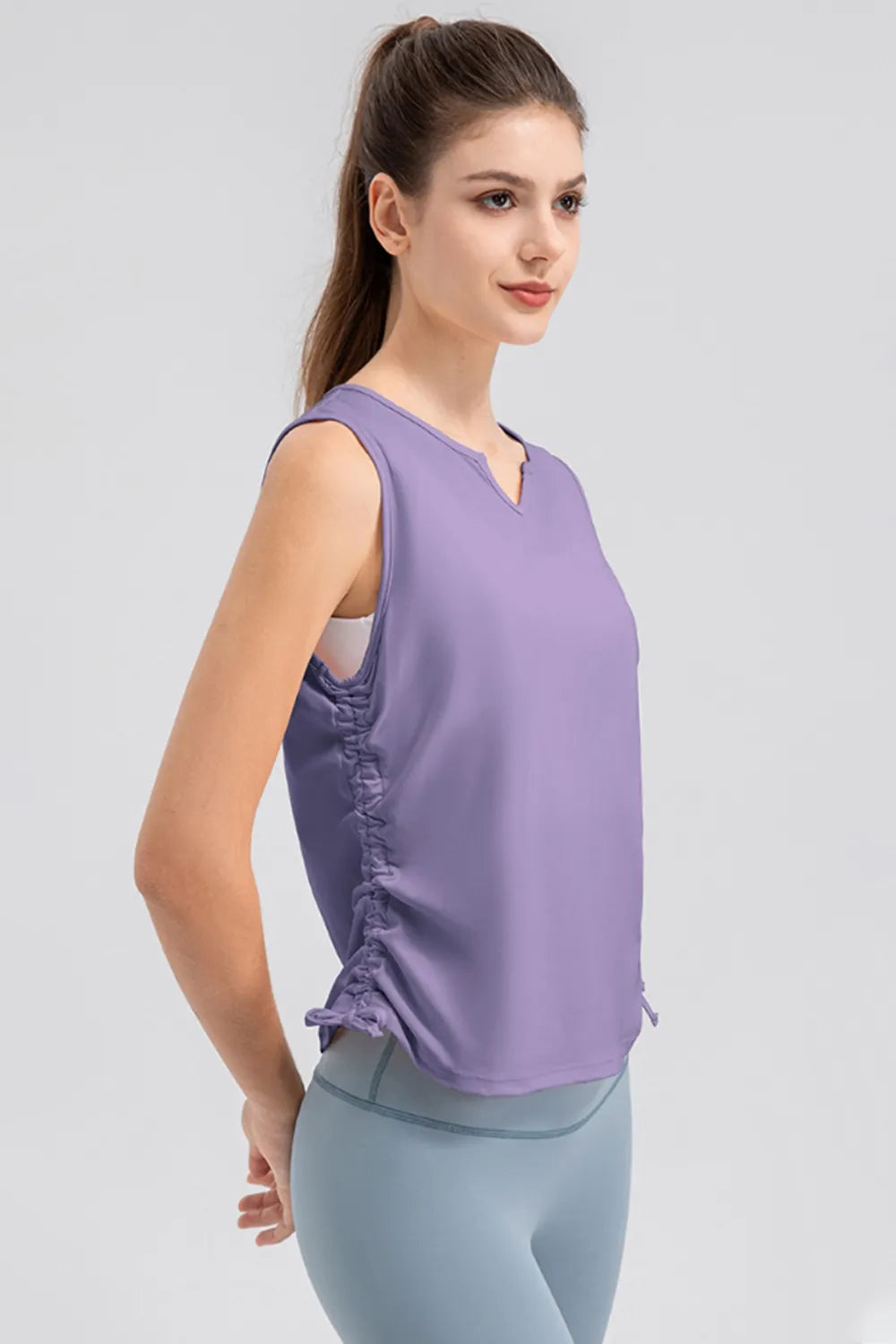Notched neck wide strap active tank side view