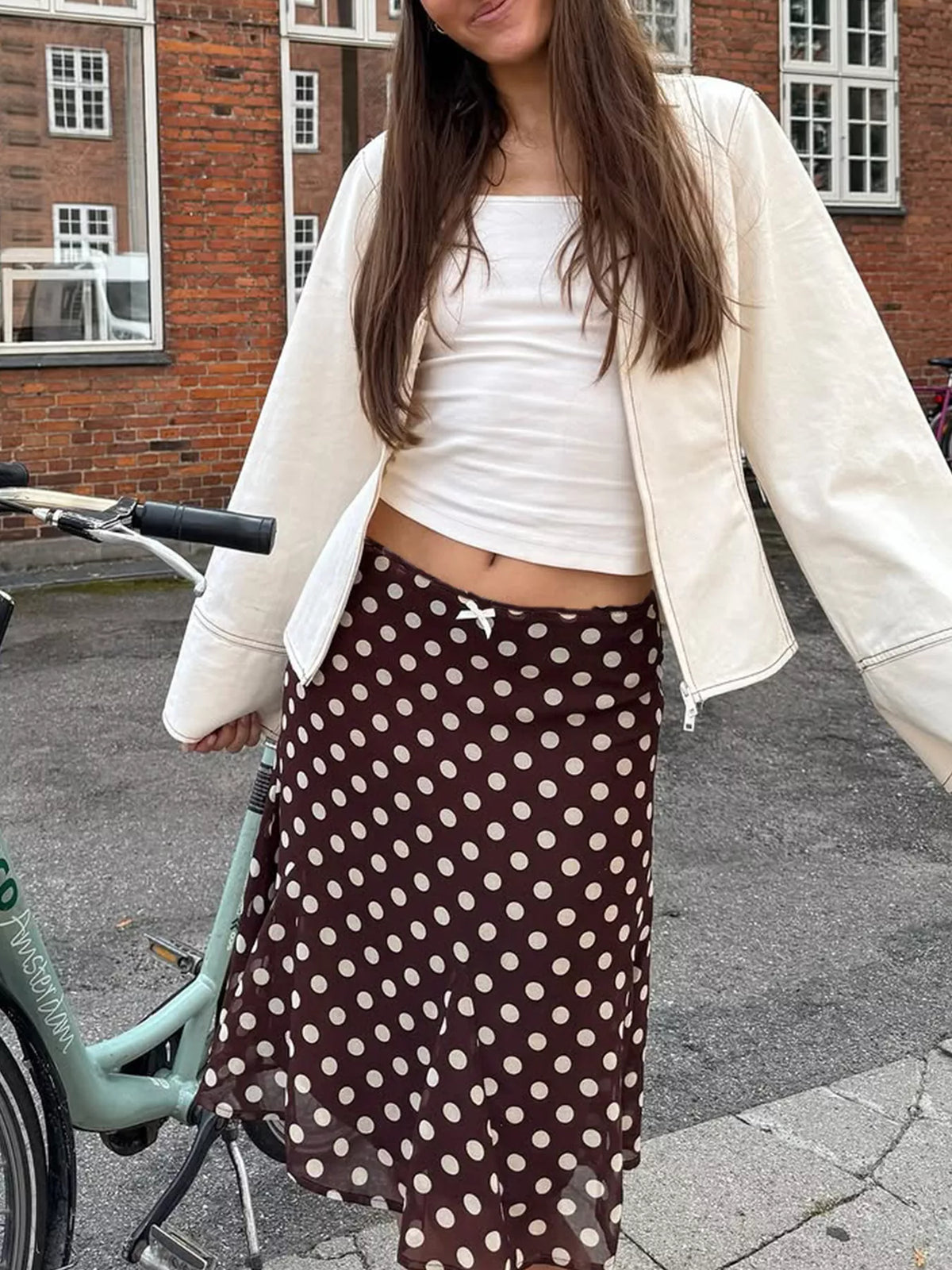 Dark brown polka dot midi skirt side view