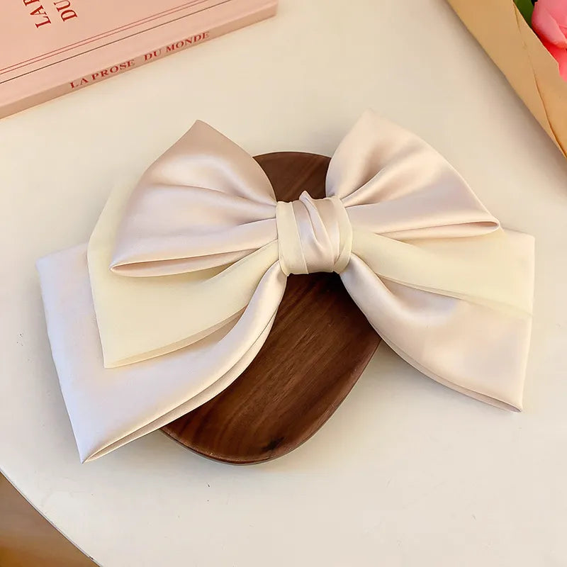 Bow cloth hair clip angled view