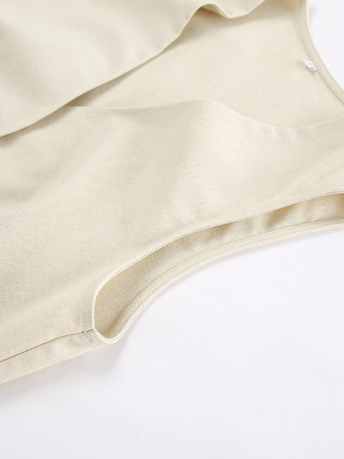 Beige vest and matching shorts outfit view