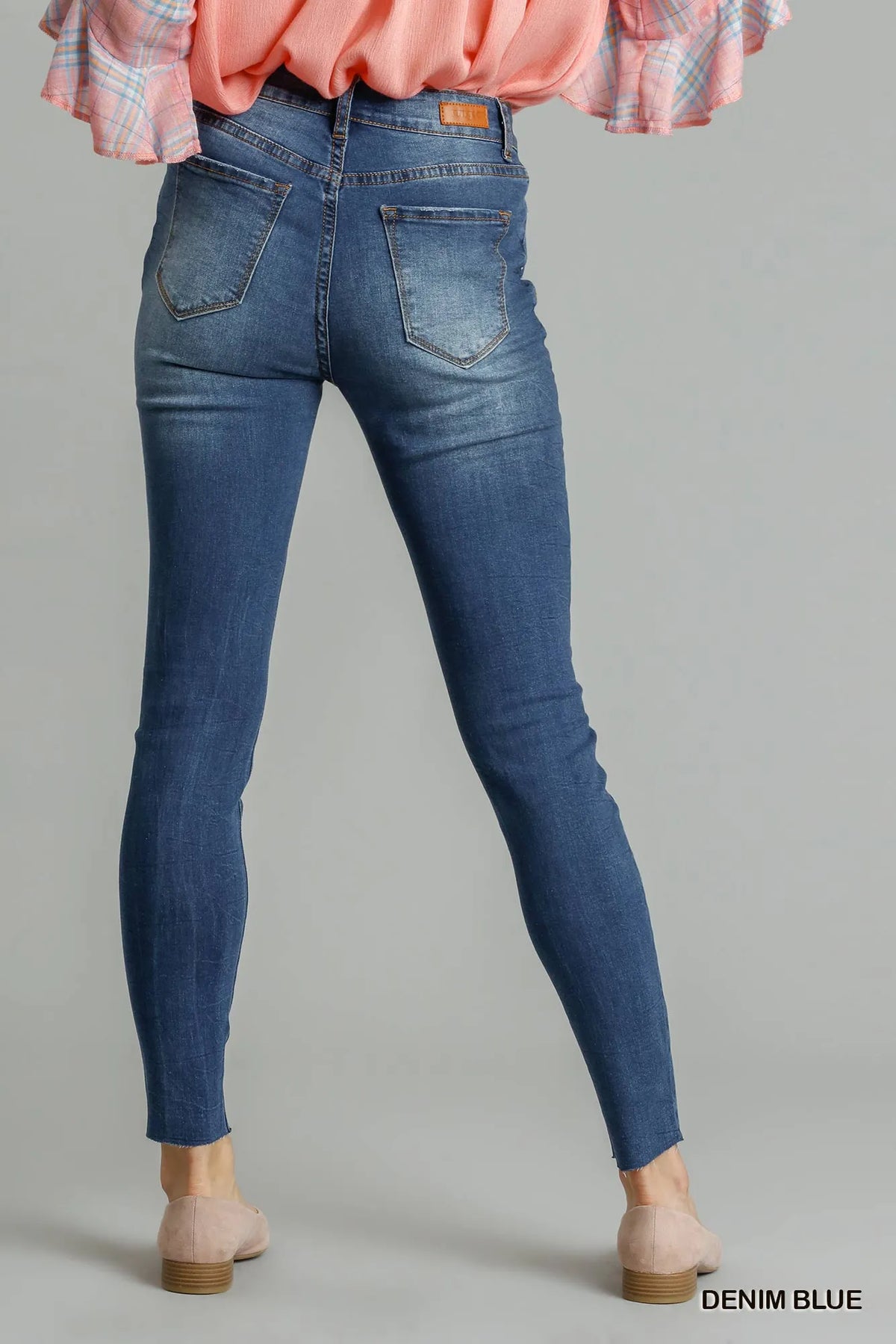 Medium blue skinny denim side profile