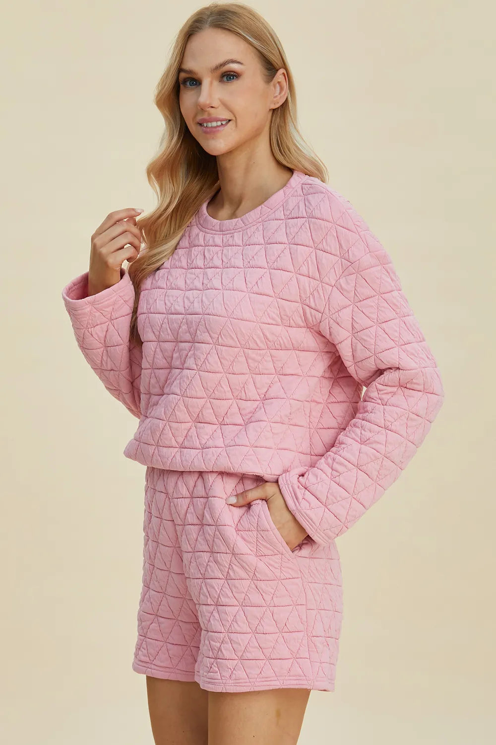 Back view of textured long sleeve top and shorts set