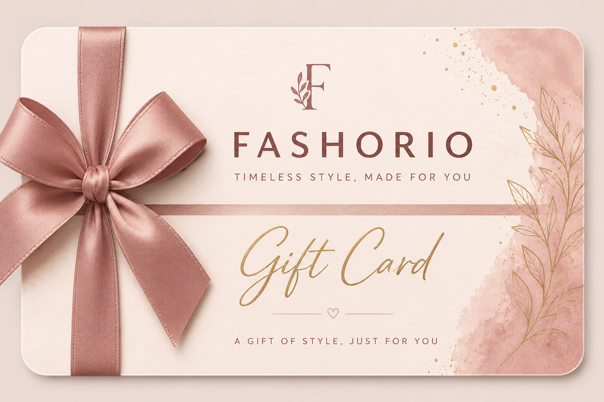 A rectangular Fashorio gift card with rounded corners, featuring a large dusty rose satin bow on the left, gold and dark brown typography, and soft pink watercolor floral accents on a light cream background.